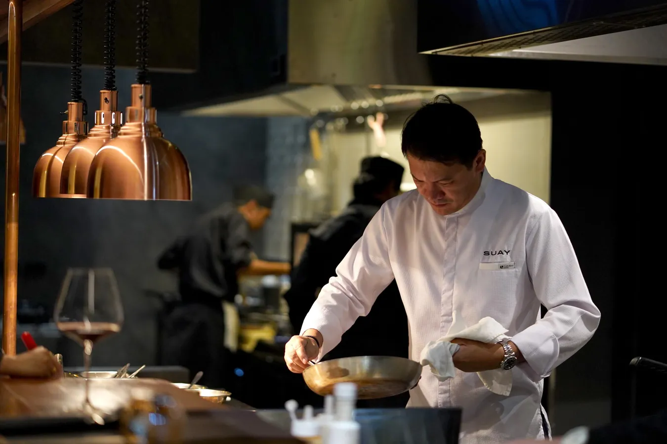 Chef Tammasak at work in the kitchen
