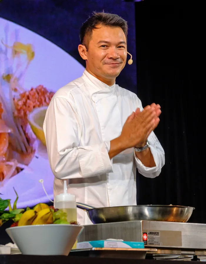 Chef Tammasak at a cooking demonstration