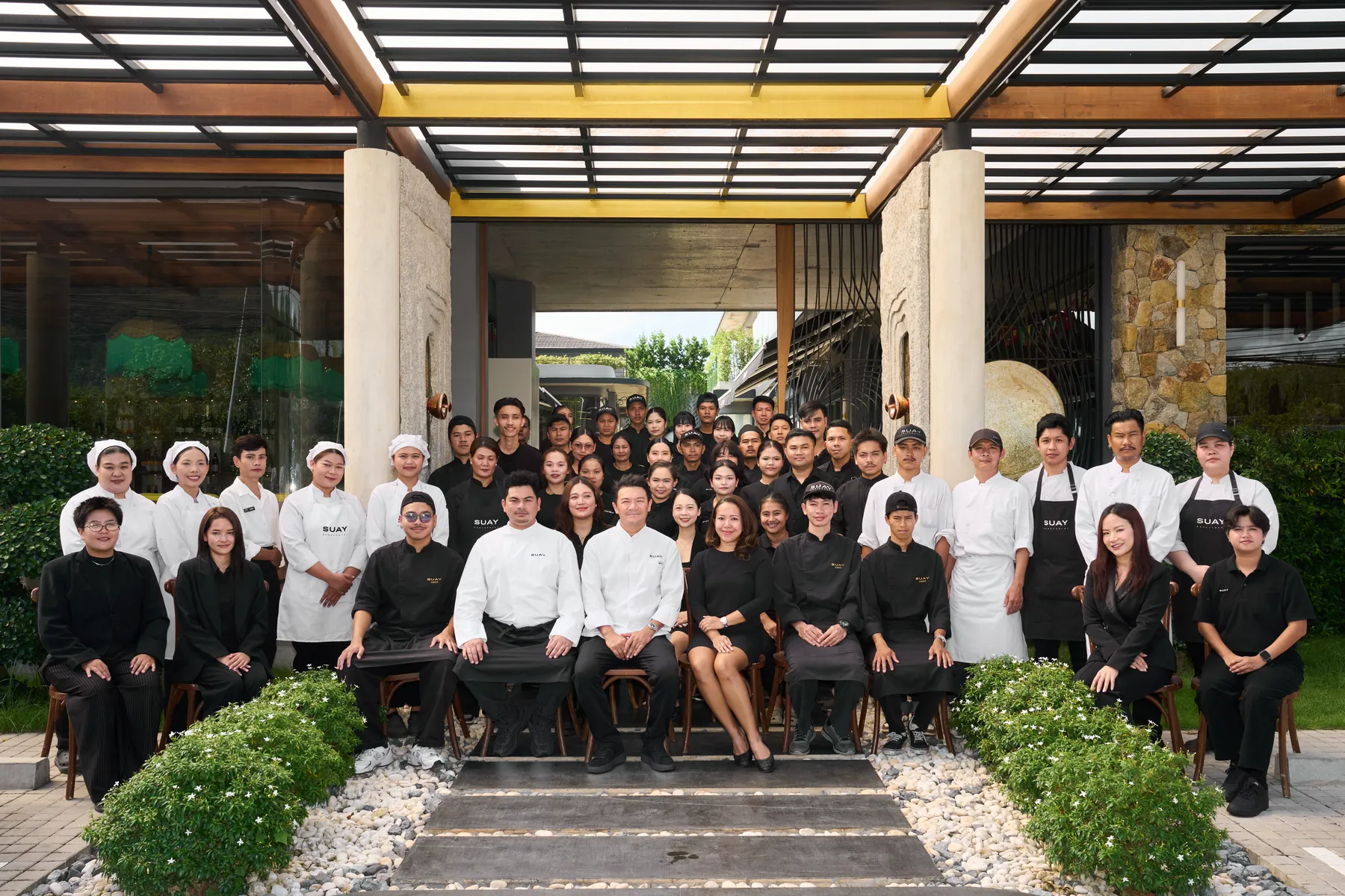 The SUAY team — kitchen, service and events, at SUAY Restaurant